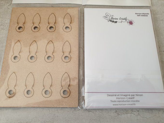 12 flipettes en bois (mdf), à customiser, à fixer avec une attache parisienne (vendue séparément)