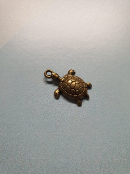 Breloque en métal couleur bronze, tortue, dimension : 2.7x1.8cm environ , à l'unité