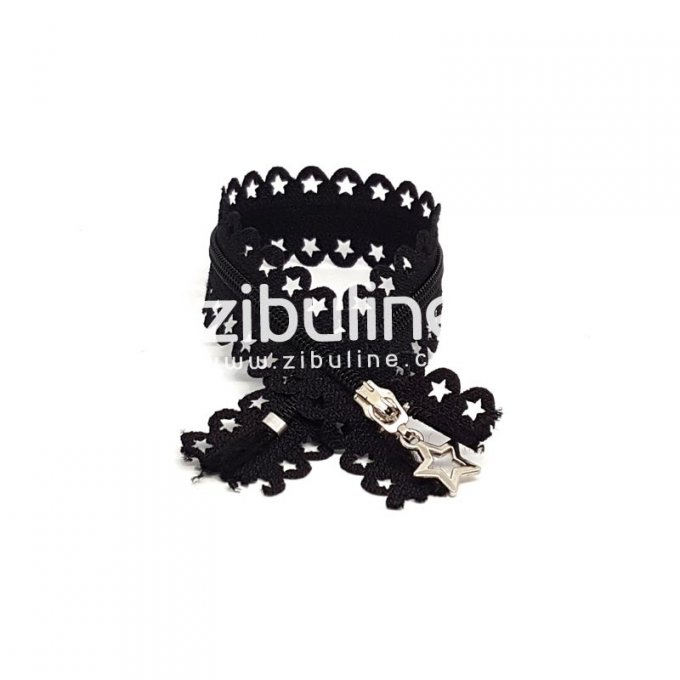 Fermeture éclair dentelée et évidée en forme d'étoile - couleur noir - longueur 25cm